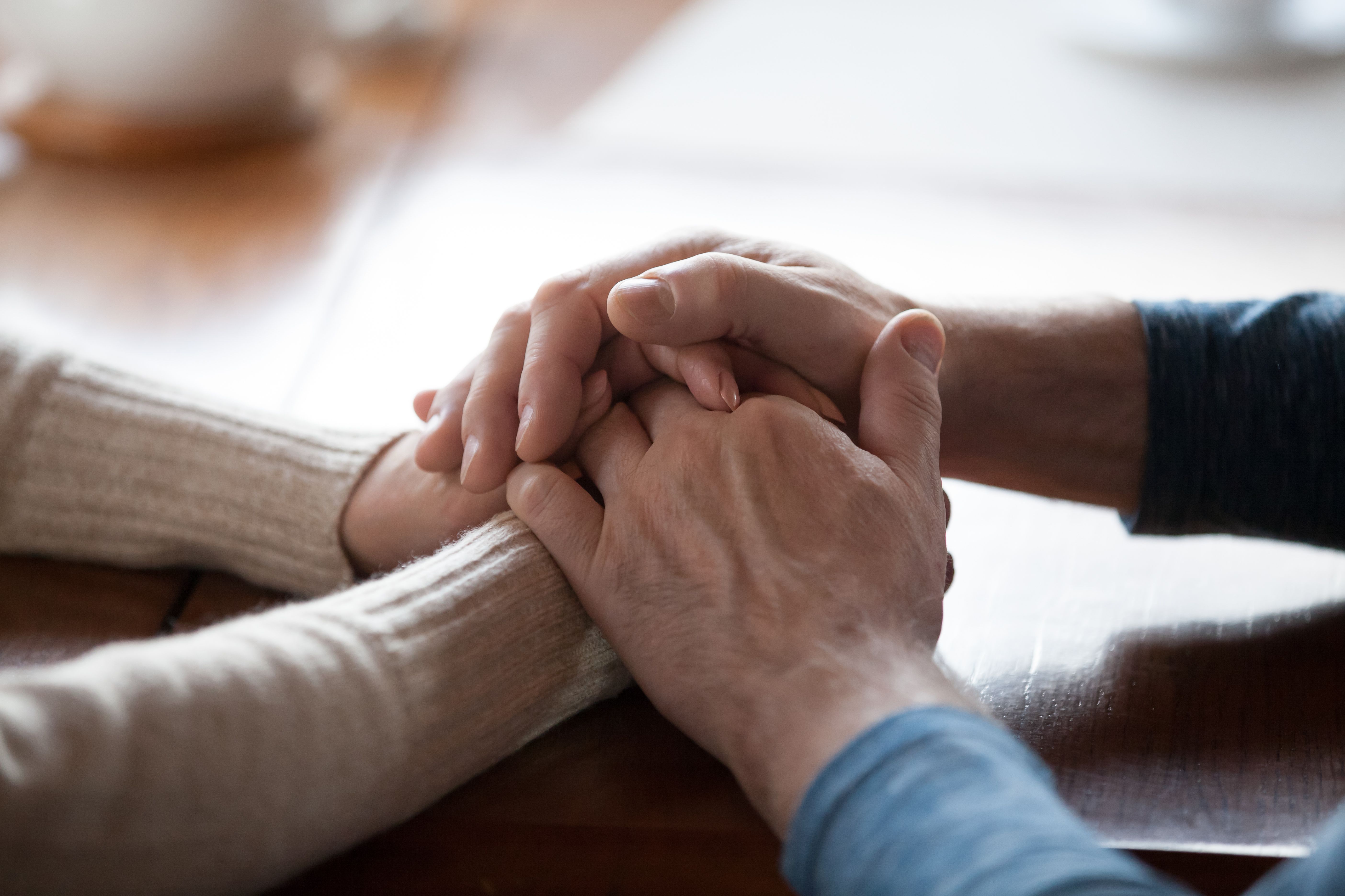 Hands holding