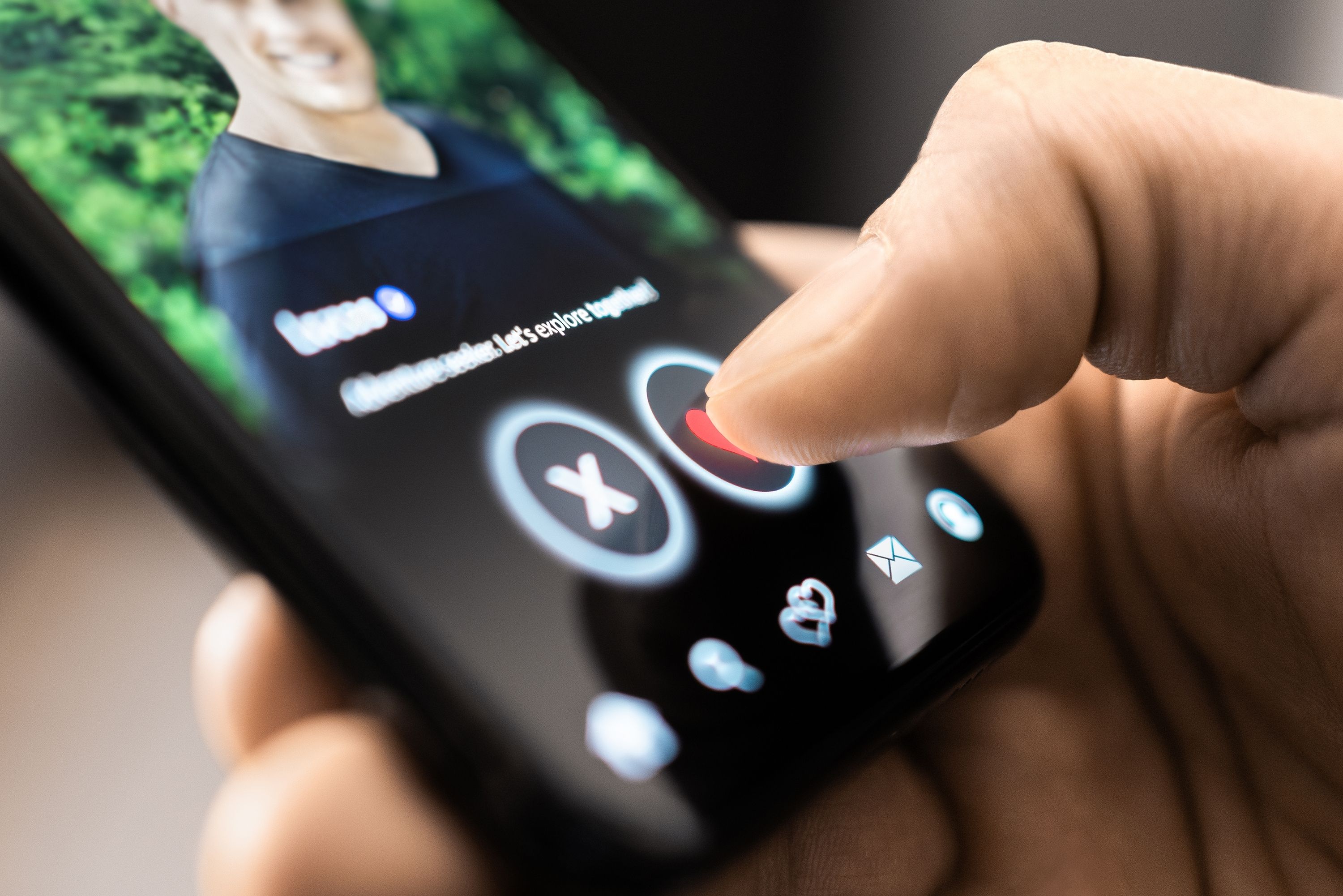 Man swiping on a dating app